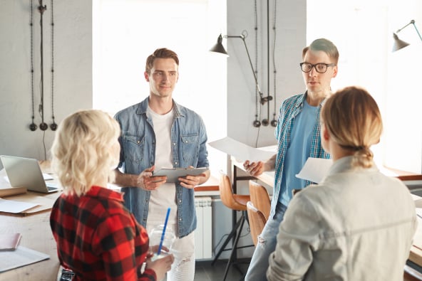 A group of colleagues at a daily stand up