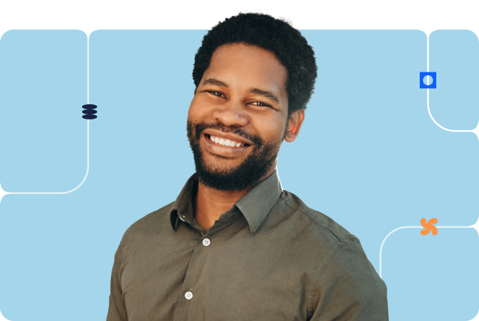 A person in a professional outfit in front of a blue background