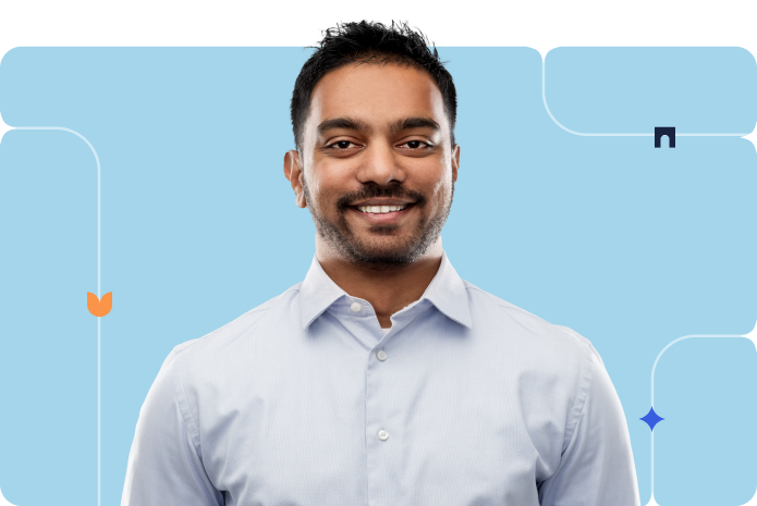 A professional businessperson in a button up shirt smiles in a portrait against a branded blue background