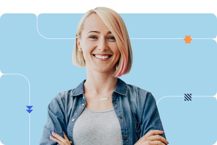 A person wearing a denim shirt smiles confidently against a blue background