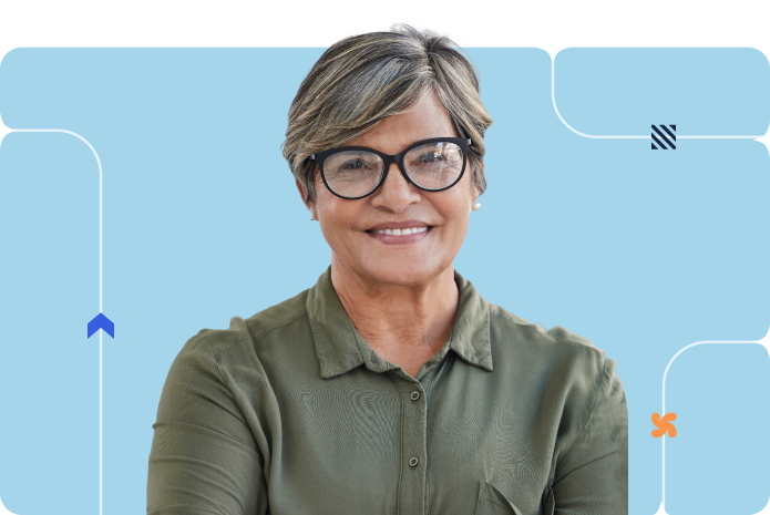 A person smiles professionally in a portrait against a blue background